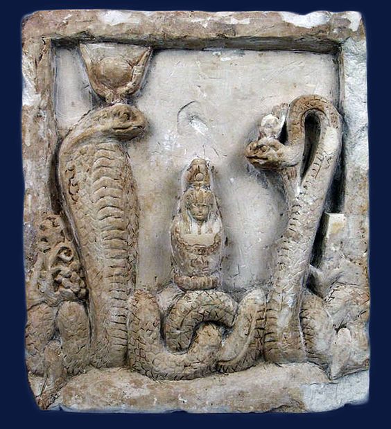 Stela with Isis, Serapis and Canopus jar.jpg